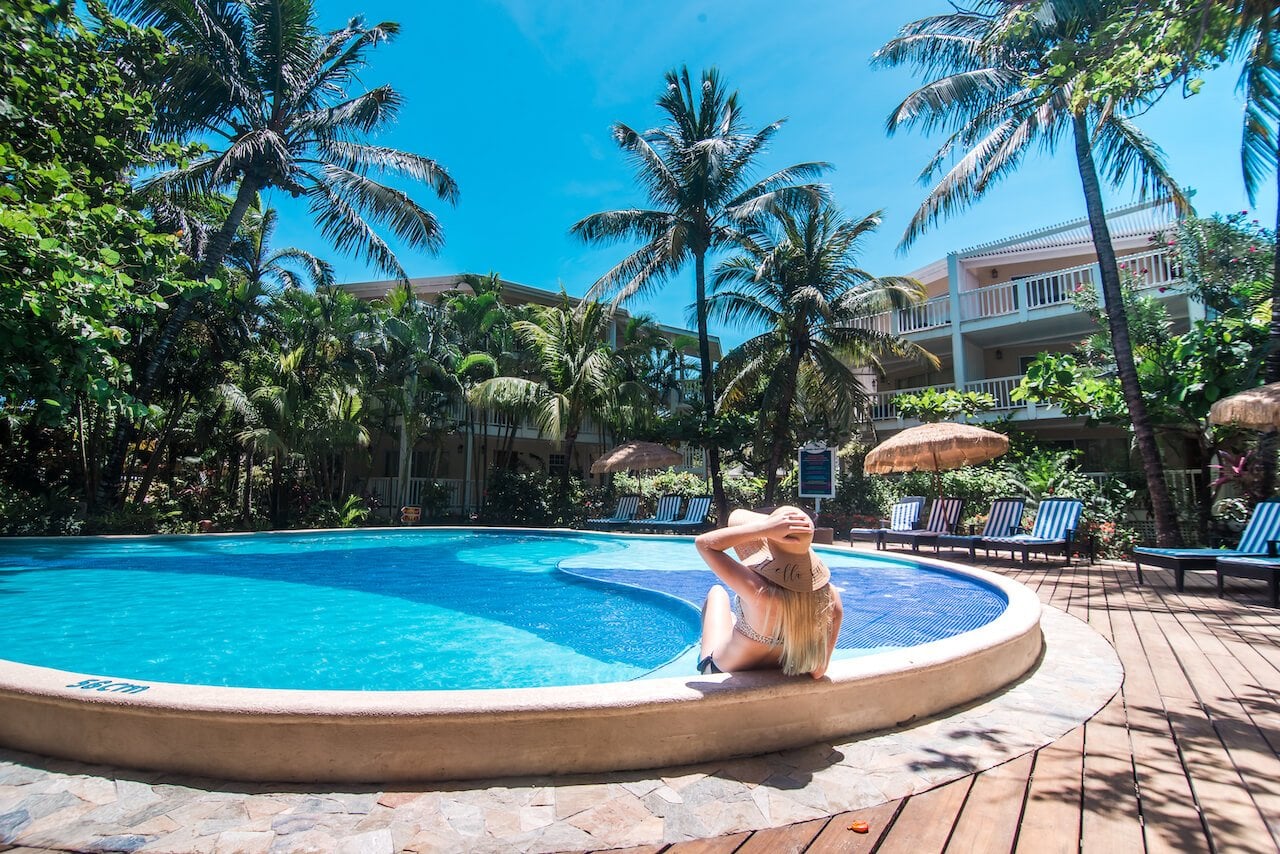 Private Monkey & Sloth Hangout + West Bay Beach Resort Day Pass